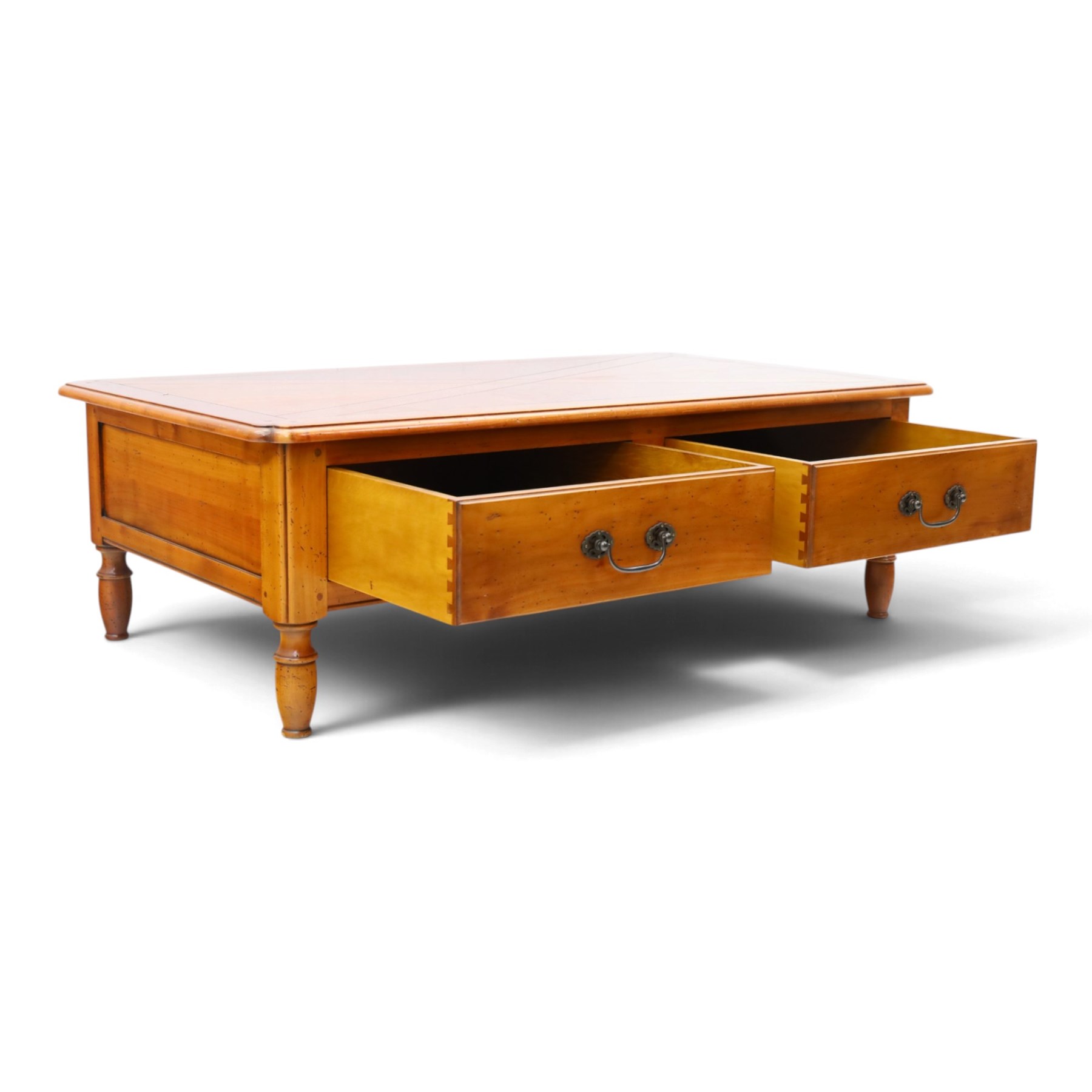 Wesley Barrell - French cherry wood coffee table, rectangular top inlaid with a geometric cross design, stone inlay with two frieze through drawers and metal drop handles, on short turned supports