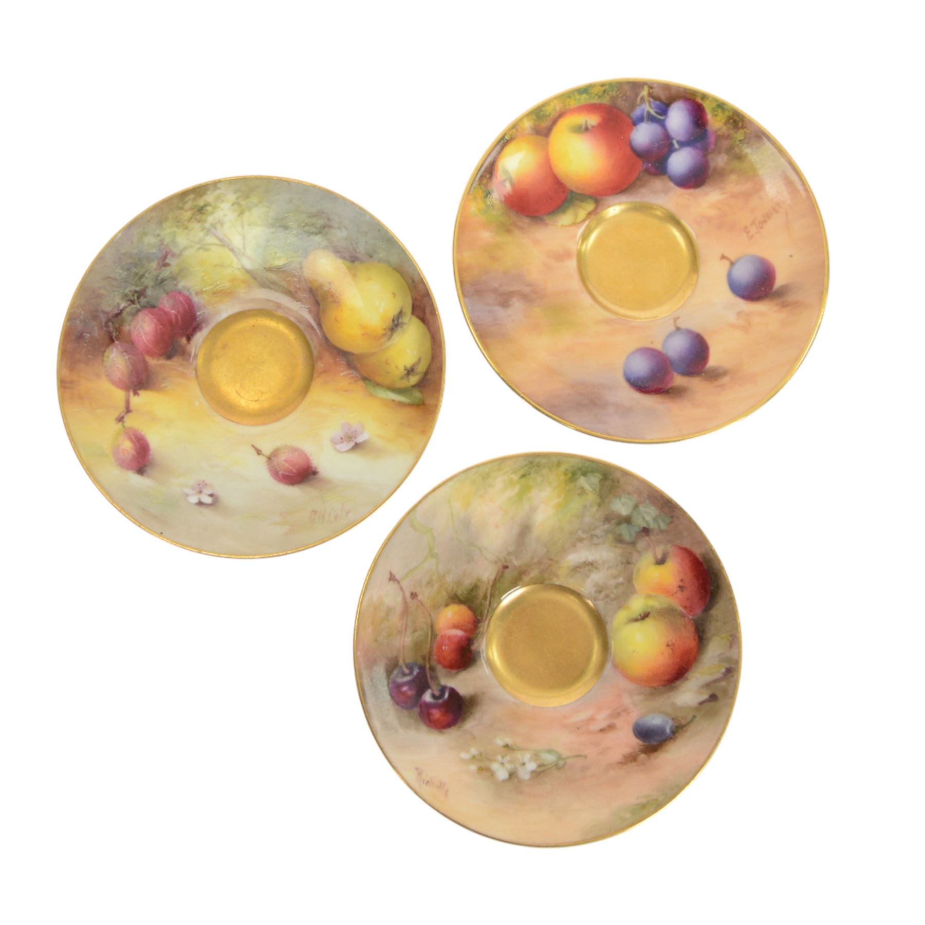 Two small 20th century Royal Worcester cabinet cups and saucers, together with another saucer, each painted with a still life of fruit upon a mossy ground, bearing various signatures: E Townsend, Ricketts, G H Cole, and H Ayrton, each with puce printed mark beneath, teacups approximately H3cm D5.5cm, coffee cup H4.5cm, saucers 9.5.cm