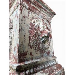 Early 20th century terracotta pedestal, square form with egg and dart detail, four lions masks to either side, finished in distressed cream paint