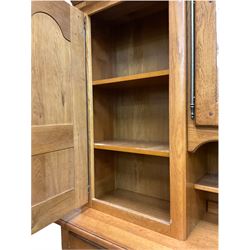 Barker and Stonehouse - oak dresser, the raised back fitted with glazed display cabinet and cupboards, the lower section fitted with drawers and cupboards, panelled doors