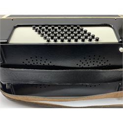 GDR Firotti piano accordion with black and silver case, sixteen keys and forty-eight buttons L38cm; in simulated reptile skin case with sheet music