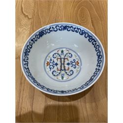 19th century Chinese  Doucai porcelain bowl decorated in blue, orange etc, the interior with a double scroll panel, six character Tongshi reign mark D15cm