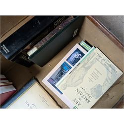 Collection of books, including Art in Britain 1890-1940 from the collection of The University of Hull and The Humber by Anthony V Watts, housed within a leather suitcase decorated with various travel labels 