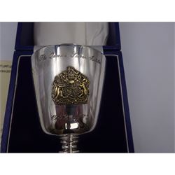 Modern limited edition silver goblet, commemorating Queen Elizabeth II silver jubilee, of plain form with gilded interior, applied Royal coat of arms to body and engraved 'The Queen's Silver Jubilee 1952-1977' upon knopped stem and circular spreading foot, limited edition no. 320/1000, hallmarked A T Cannon Ltd, Sheffield 1977, boxed with certificate, goblet H12.8cm
