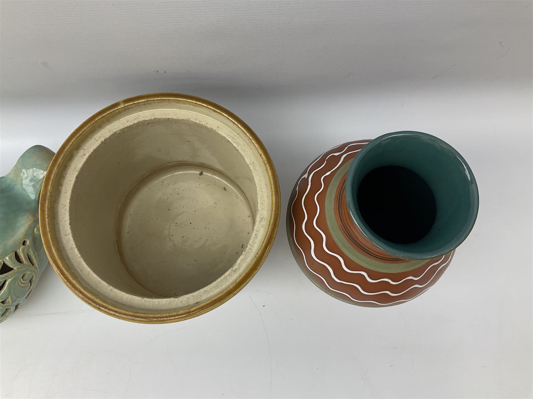 Quantity of studio pottery to include square section vase decorated with blossoming branches, other studio pottery to include jugs, bowls, vases etc, with various marks, duck egg b,J.E. bowl stamped Buchan, continental pottery, other stoneware pottery to include glazed jar with lid etc