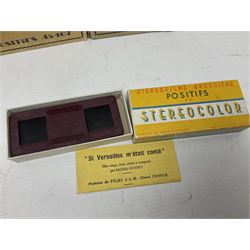 Two Stereofilms Bruguiere stereoscopes with seven boxes of related stereo positive slides to include one colour example entitled ‘Si Versailles m’etait conte’ Serie No.1, all in original boxes