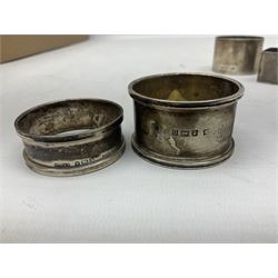 Four silver napkin rings, comprising three circular examples, and one rectangular example, each hallmarked, approximate total weight 83.4 grams