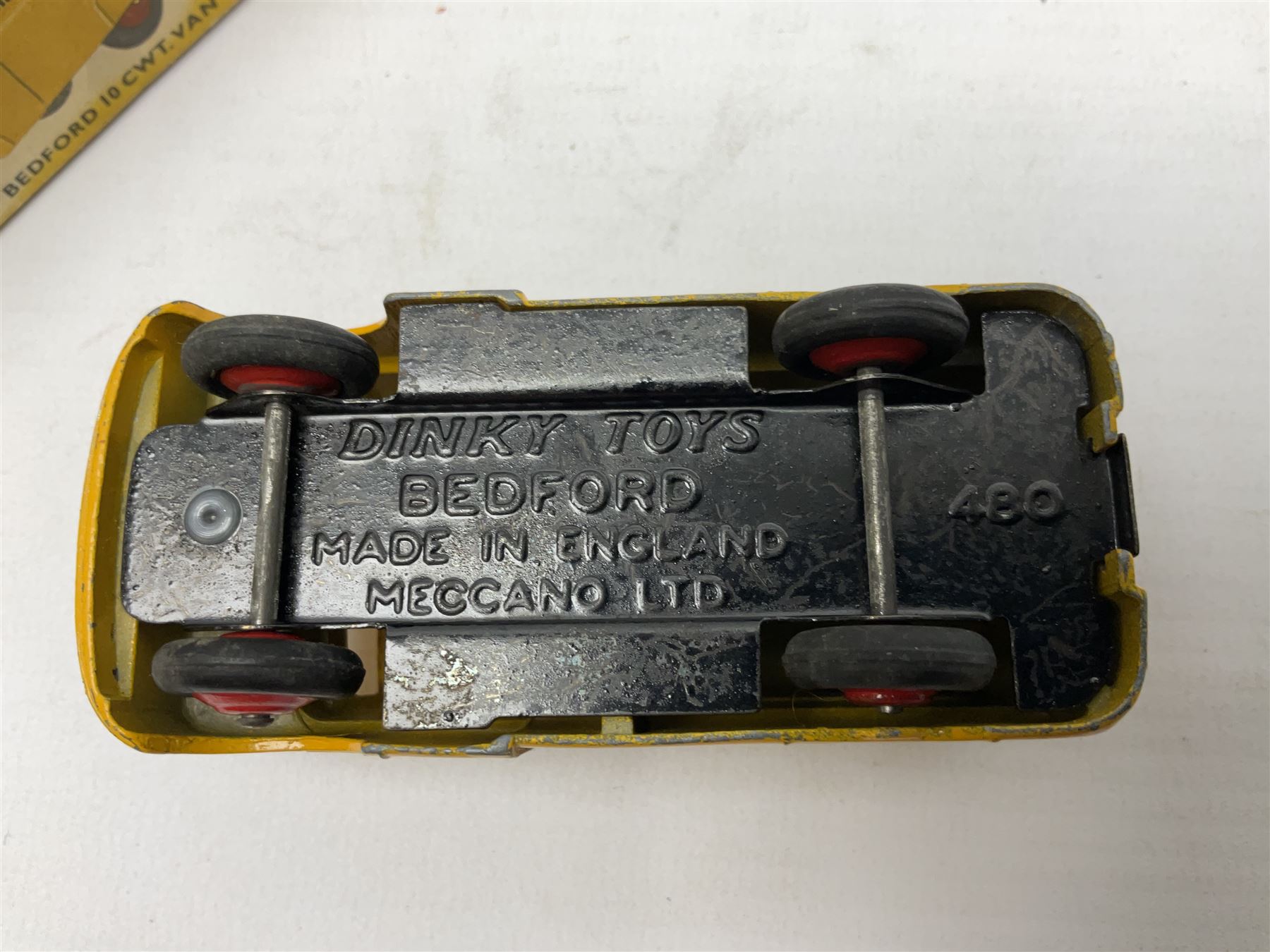 Dinky - Bedford 10cwt Van 'Kodak' No.480, boxed; and six unboxed and playworn models including Trojan Chivers Jellies van, loudspeaker van, Daimler Ambulance, N.C.B. Electric Van and two buses (7)