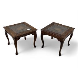 Pair of Pakistan carved hardwood brass inlaid lamp tables, square form, cabriole legs, inset glass tops