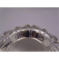 Pair of modern silver bon bon dishes, each of oval form with pierced sides and shaped rim, hallmarked A Chick & Sons Ltd, London 1967, L18cm, W13.5cm