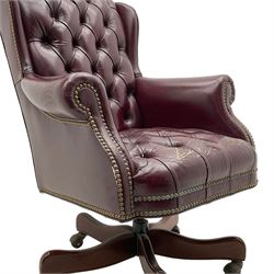 Hancock & Moore - swivel office desk chair, upholstered in buttoned burgundy leather with studded bands, five-spoke base on castors