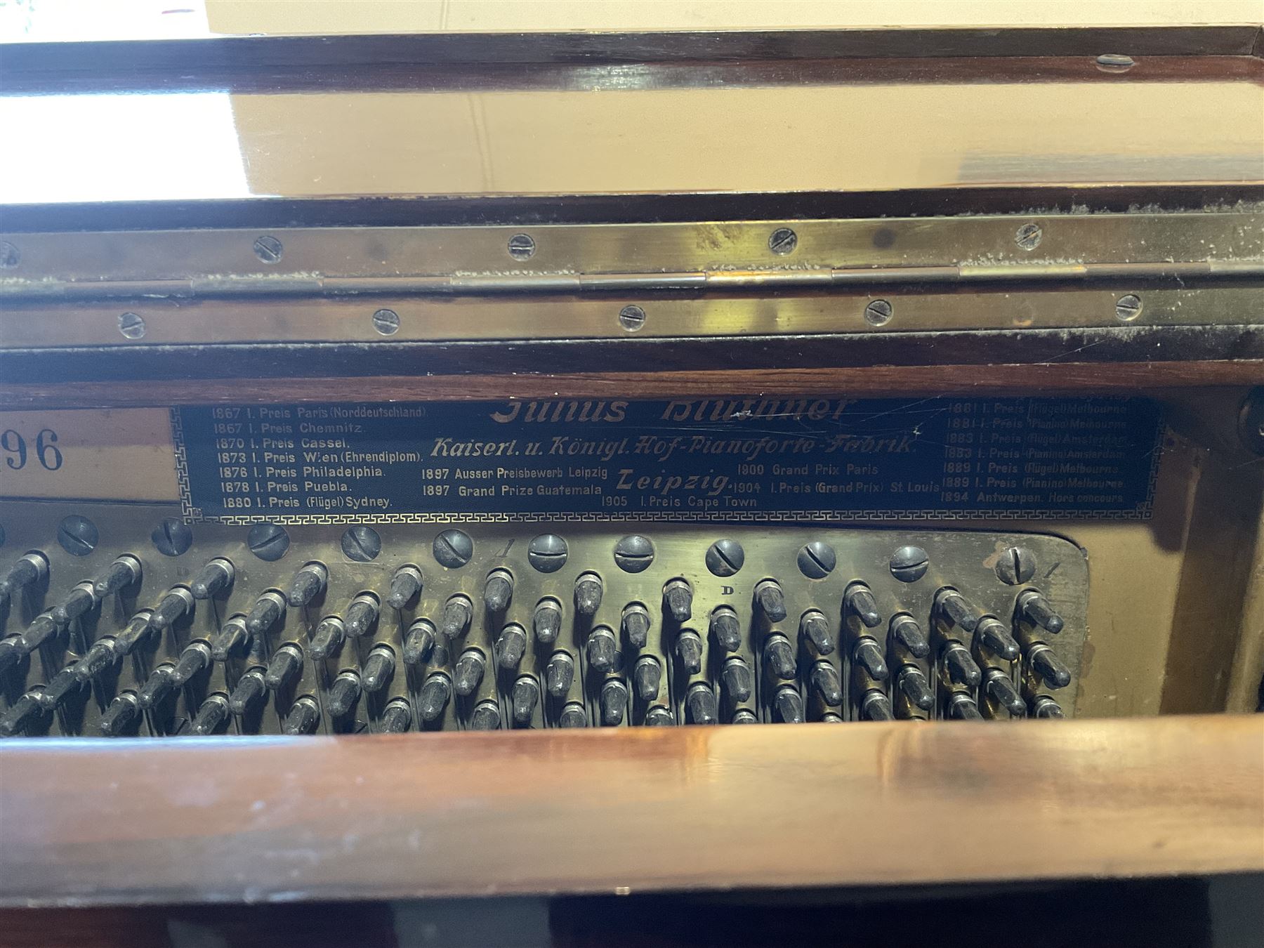 Bluthner of Leipzig - Early 20th century overstrung upright piano, serial number 79496 (1910), in a mahogany case with three front case panels and folding music desk, with 85 keys (seven octaves) underdamper action, original hammers, stringing, tuning pins, dampers and felts, with sostenuto and sustain pedals. Julius Bluthner was considered to be one of the the best makers of German upright pianos in the early 20th century both for tone quality and build. 

This item has been registered for sale under Section 10 of the APHA Ivory Act.