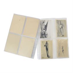 Fifteen German Third Reich and Dutch postcards, including Winter Help Work postcards, Dutch Anti Hitler cards and Third Reich Aeroplane cards
