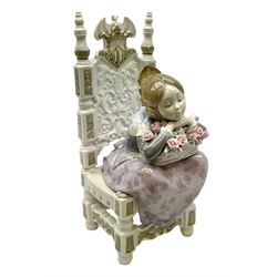 Lladro figure Appreciation, modelled as a girl upon a chair leaning on a basket of flowers, no 1396, H27cm