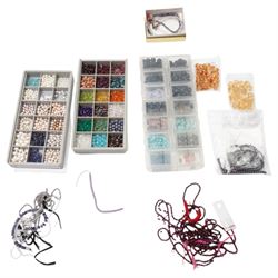 Collection of various beads, including turquoise, citrine, amethyst, garnet, iolite, ruby,...