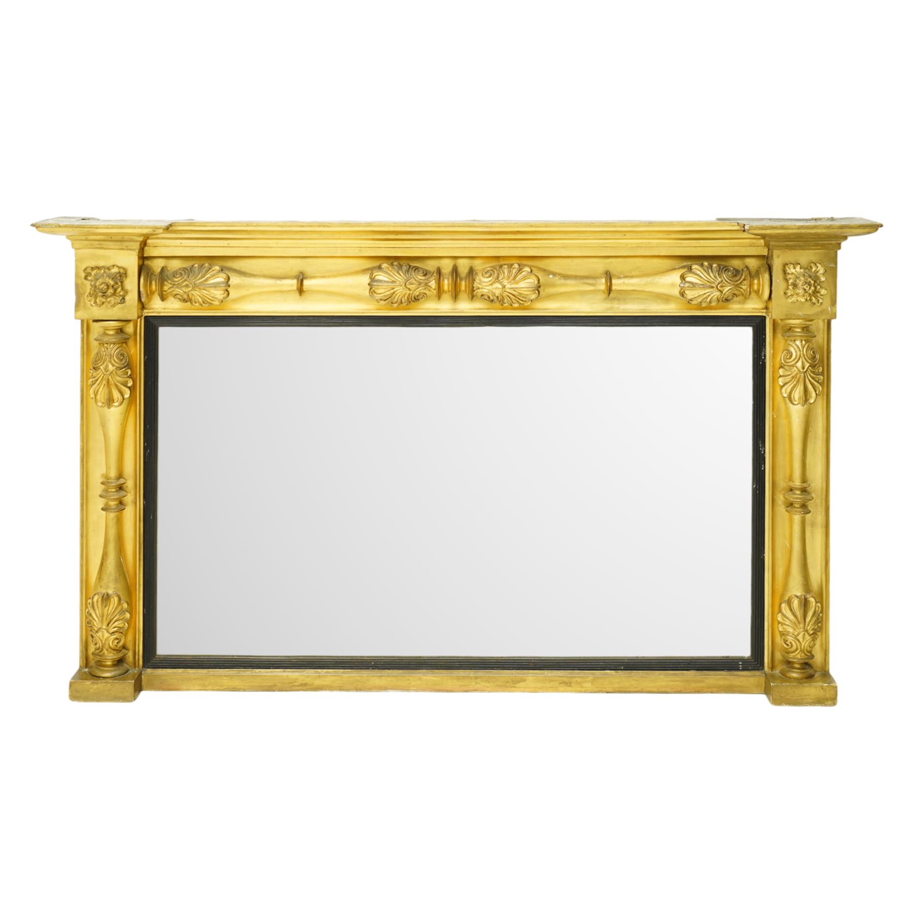 Early 19th century Regency giltwood and gesso overmantel mirror, rectangular plate within a black inner border, form with stepped cornice above a frieze carved with shell and foliate motifs, flanked by swell turned fluted pilasters with applied anthemion decoration