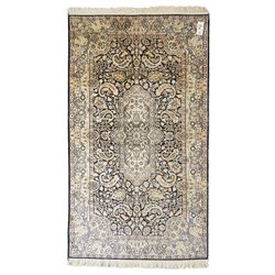 Persian style rug, central medallion with symmetrical floral arabesques, complex and layer...