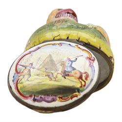 Rare 18th century Birmingham enamel bonbonniere, circa 1760, modelled as a grinning tiger laid upon a grassy sgraffito mound, the base decorated with a lion hunting scene after Antonio Tempesta, within a polychrome scroll surround, H5.5cm D6cm
