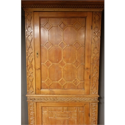  Georgian stripped pine floor standing corner cupboard, panelled doors with geometric moulding, Greek key upright decoration, W105cm, H220cm  
