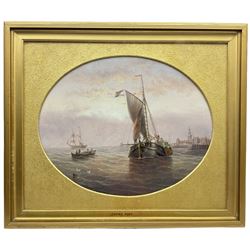 Henry Redmore (British 1820-1887): Sailing Barge leaving Port, oval oil on board signed and dated 1887, 39cm x 49cm