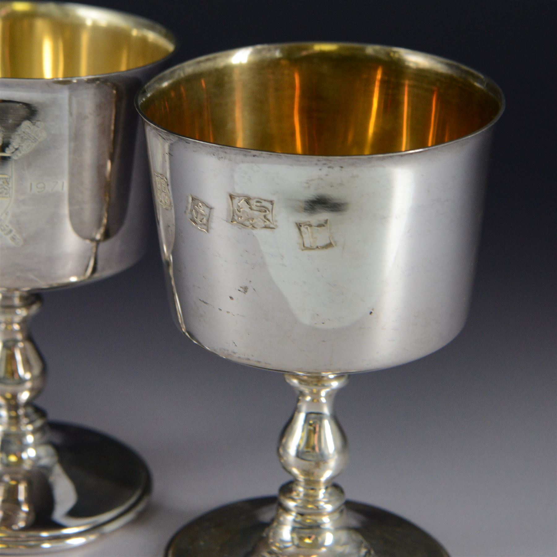 Pair of limited edition silver goblets, commemorating the 1900th  founding of the city of York by, the plain bowl with gilt interior and engraved with York crest dated AD71-1971, upon knopped stem and circular domed foot, hallmarked Barker Ellis Silver Co, Birmingham 1970, H11cm