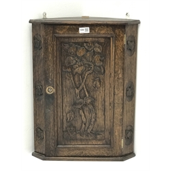  Small early 20th century carved oak corner cupboard, H56cm, W43cm  