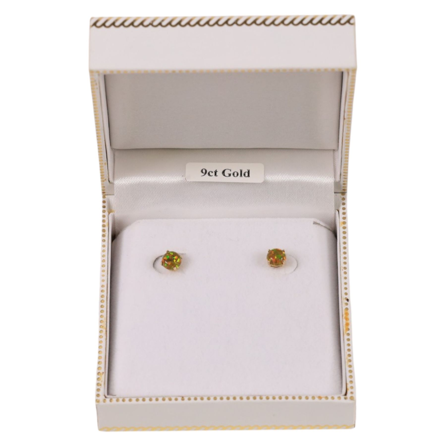 Pair of 9ct gold opal stud earrings, boxed