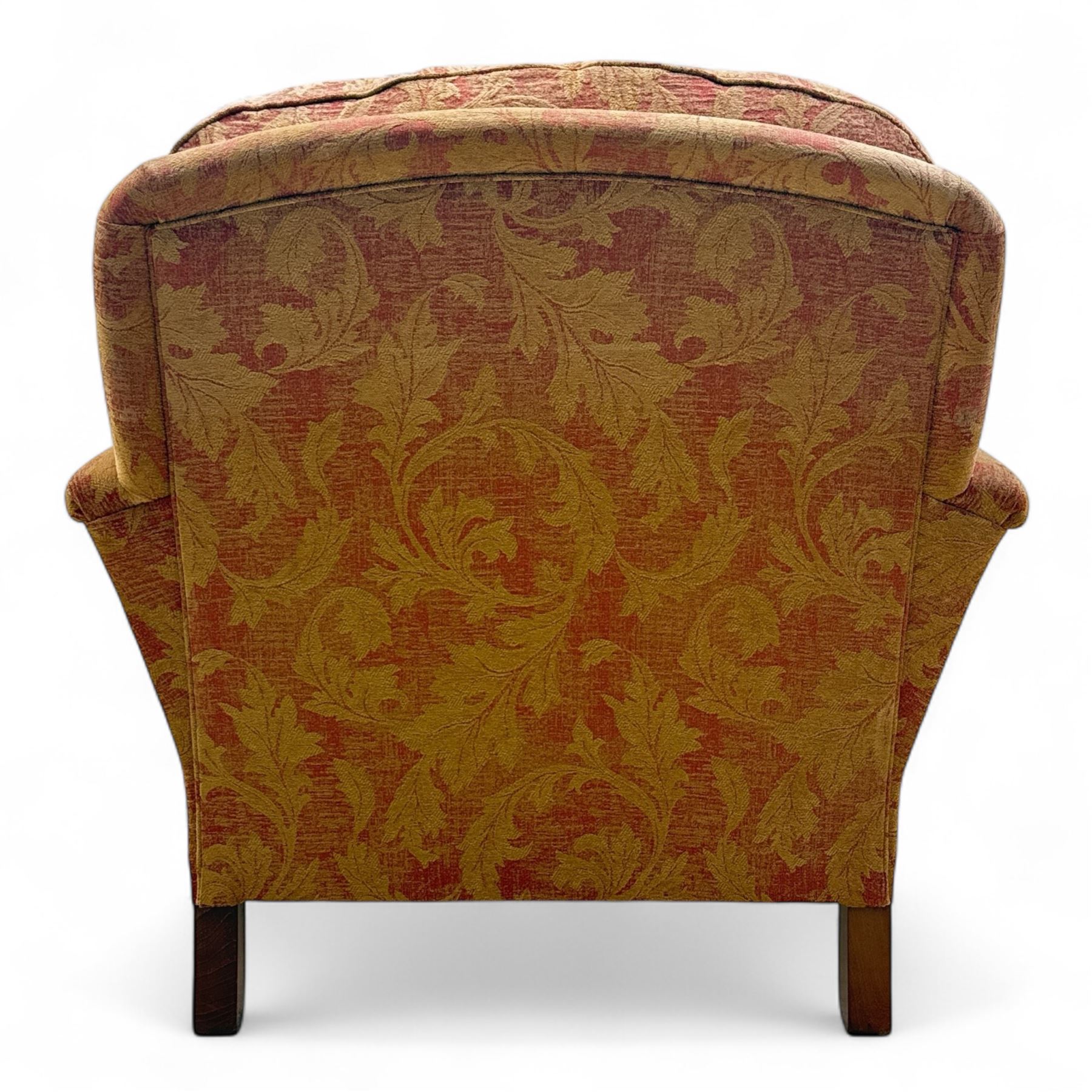 Duresta - Contemporary pair of upholstered armchairs, in red and gold damask style fabric, each with sprung seat and removable cushion back, rolled arms, on turned front supports with brass castors, square back legs 