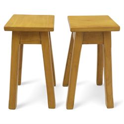 Late 20th century pine kitchen table and two stools, the rectangular drop-leaf table with straight legs, together with two square-topped stools 