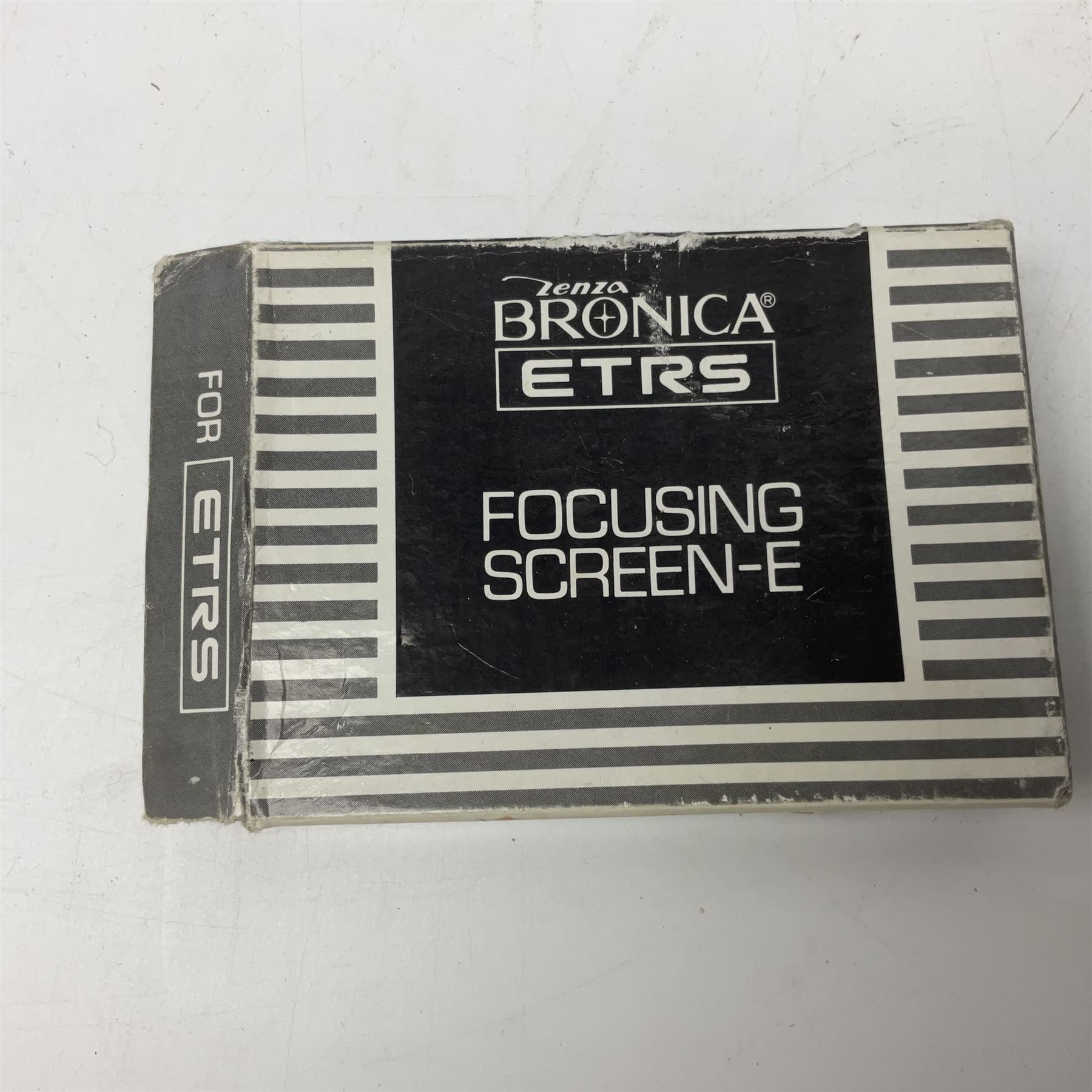 Zenza Bronica ETRS camera body, safari edition, serial no. 7100811, with 'Zenza Bronica Zenzanon EII 1:2.8 f=75mm' lens, serial no. 7908591, film magazine back, safari, serial no. 8100564, AE-ii metering head, safari, serial no. 617024, etc, all in leather case