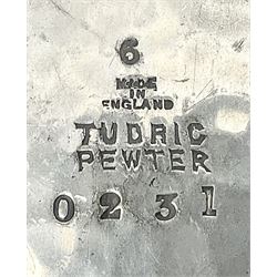 Archibald Knox for Liberty & Co Tudric pewter three piece tea service, comprising teapot with woven reed handle, single handled open sucrier, and milk jug, each with planished finish and detailed with honesty flowers, each impressed beneath Made in England Tudri Pewter 0231 