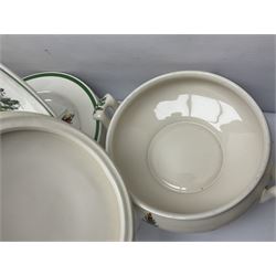 Collection of Spode Christmas Tree pattern part dinner service, comprising three covered tureens, eight dinner plates, eight side plates, eight dessert plates, sauce boat and saucer and serving platter (30)