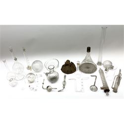 Collection of 19th century and later pharmaceutical laboratory glass, to include, volumetric flasks of various sizes, conical flask, stratus flask, etc (25) Provenance: discovered in the storeroom of a long established Hull pharmacist and opticians