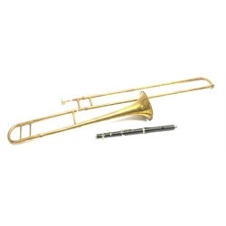 Butler brass two-piece slide trombone with mouthpiece L107cm; together with a Miller Browne London two-piece marching flute with nickel mounts (2)
