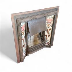 Art Nouveau Cast Iron Fire Surround and fire brick, with floral design tiles inlayed,