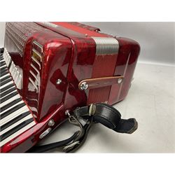 Clinkscale Crucianelli piano accordion in red pearline case with one-hundred and twenty buttons and forty-one keys L52cm; in carrying case