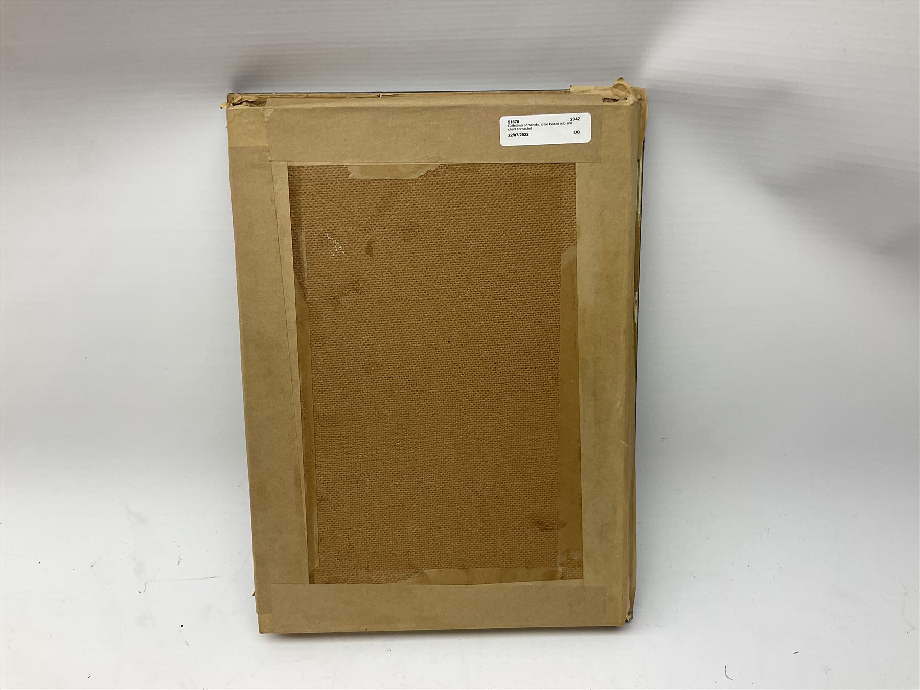 Framed display of medals and badges relating to Captain Cynthia Page of Queen Alexandra's Royal Army Nursing Corps including WW2 War Medal and Defence Medal with miniatures; Red Cross Society 3-Year Service Medal; Q.A.R.A.N.C. cap badge; Girl Guide and silver Scout badges; rank epaulettes; and related photographs 33 x 23cm