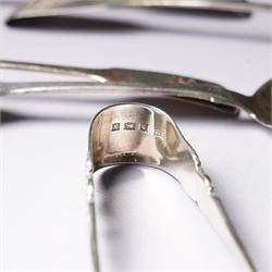 Set of six George IV silver fiddle pattern tea spoons London 1827 engraved with initials and a pair of later sugar tongs