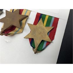 Representative display of WWII Campaign stars comprising 1939-1945 Star, Atlantic Star, Air-Crew Europe Star, Africa Star and Pacific Star; together with the corresponding group of miniatures; all with ribbons