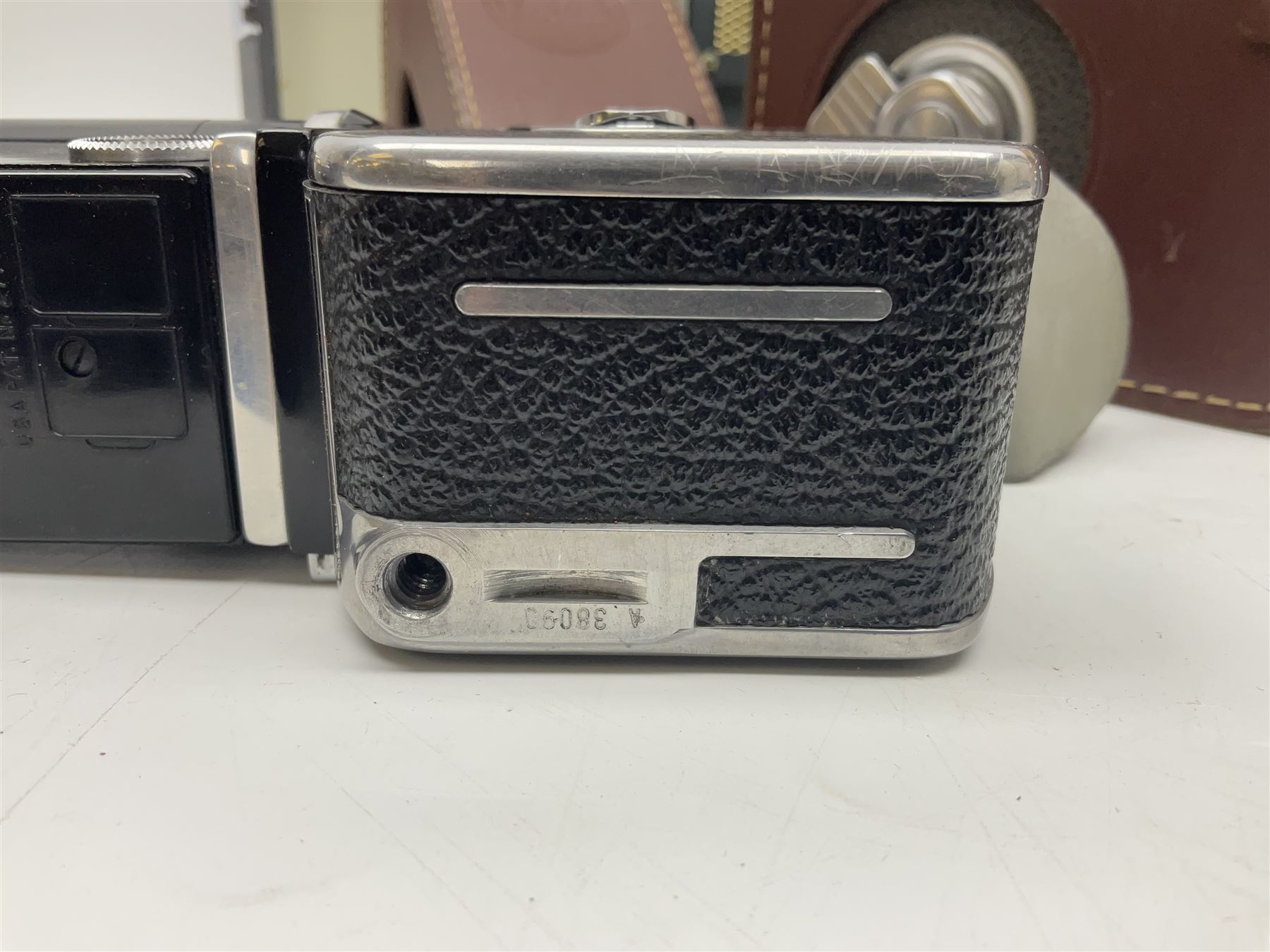 Bolex Paillard P3 Zoom Reflex camera body, serial no 38090, with 'B te S.G.D.G Som Berthiot Pan-Cinor 1:1.9 f=8a 40' lens, serial no. 40251438 in case, Kodak Brownie movie camera, Kodak model 2 Brownie movie camera and a Kodak 8 Movie Projector A-15G and other camera equipment 