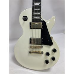 2010 Gibson Les Paul studio guitar, serial no101500537 in white finish with gold and pale green hardware, in Auden soft carry case, guitar L100cm