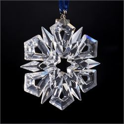 Nine Swarovski crystal snowflake Christmas ornaments, comprising years 1999-2005, 2010 and 2011, some with certificates, boxed (9)