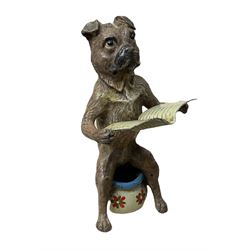 After Franz Bergmann (1861-1936): Austrian cold painted bronze figure of a pug dog reading a book, sitting on a chamber pot, with Bergmann type mark beneath H8cm