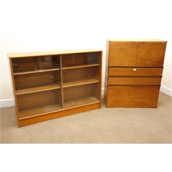  Retro teak cabinet, fall front above two drawers and cupboard doors (W82cm, H102cm, D38cm) and a teak glazed bookcase (W122cm, H90cm, D28cm)  