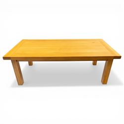 Late 20th century solid light oak dining table, on square supports
