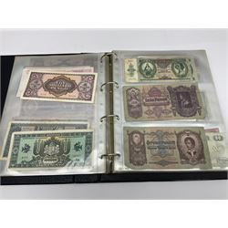 World and Great British banknotes to include Brazil, Canada, France, Germany, Ghana, Indonesia, Iraq, Hong Kong, Hungary, Japan, Vietnam, Zimbabwe, a collection of Chinese ‘Hell Money’, and quantity of ‘De La Rue Systems’ test notes, housed in ring binder and loose