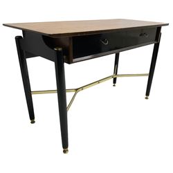 E. Gomme for G-Plan - ‘Librenza’ afrormosia and black finish console, fitted with two drawers, on turned supports united by brass stretchers (W119cm, H74cm, D52cm); together with white painted bedside lamp table (W49cm, H66cm, D50cm)