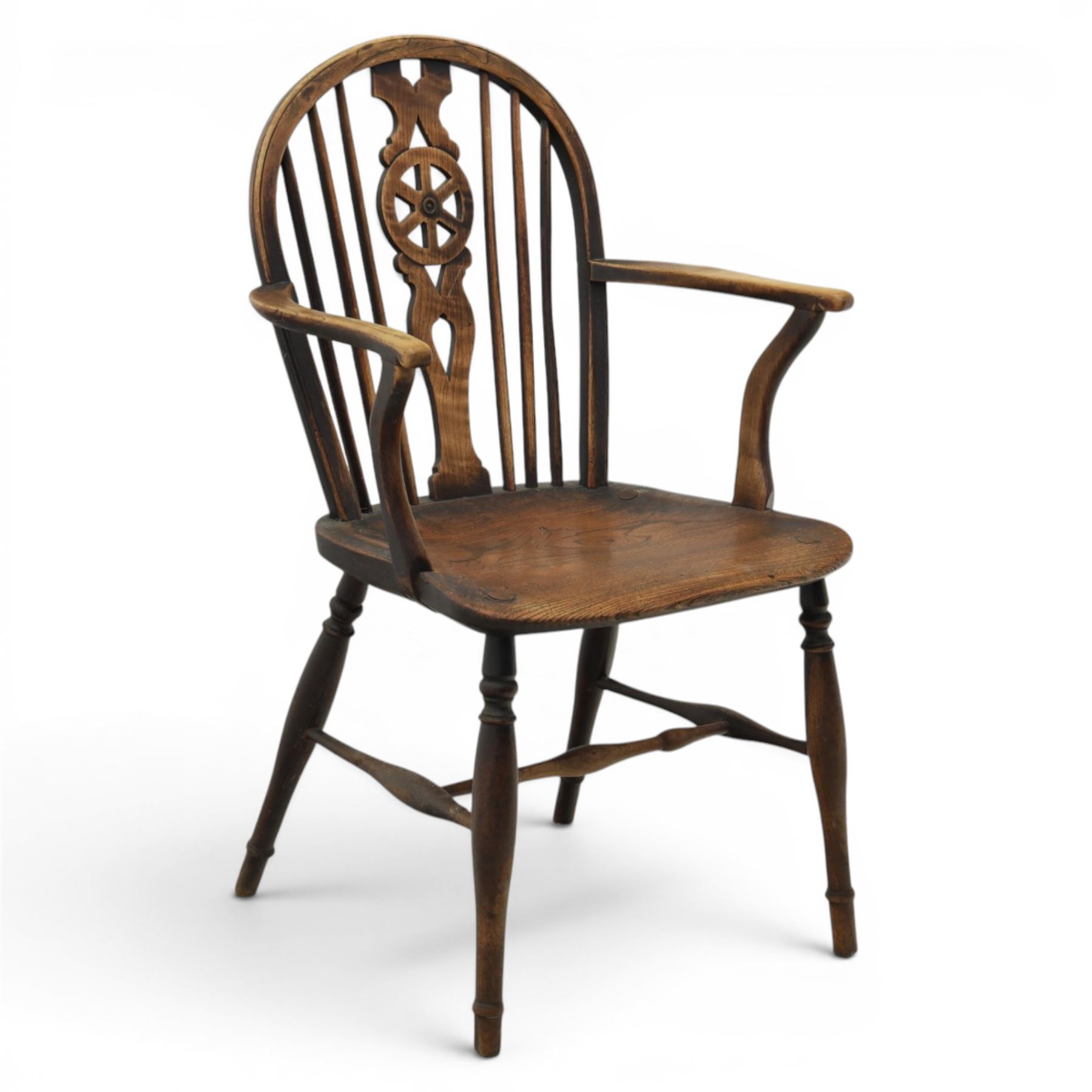Late 19th century elm and ash low-back Windsor chair, swept arms raised on turned supports  united by H-stretcher