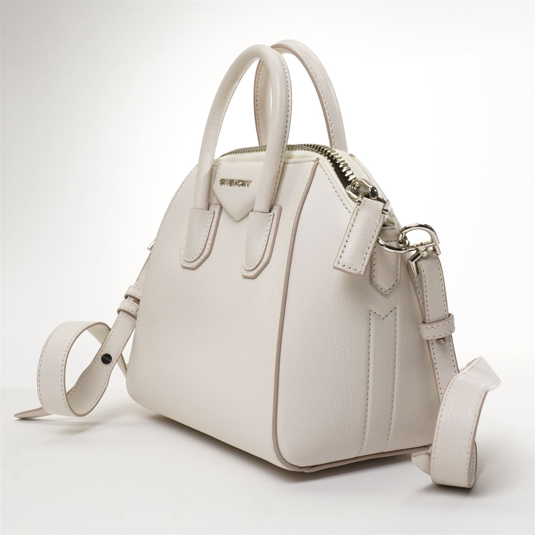 Givenchy - ‘Antigona’ Mini Bag, introduced circa 2011 under Riccardo Tisci, in structured white grained goat leather, with twin top carrying handles and detachable wide adjustable crossbody strap, with silver tone hardware, with original dust bag