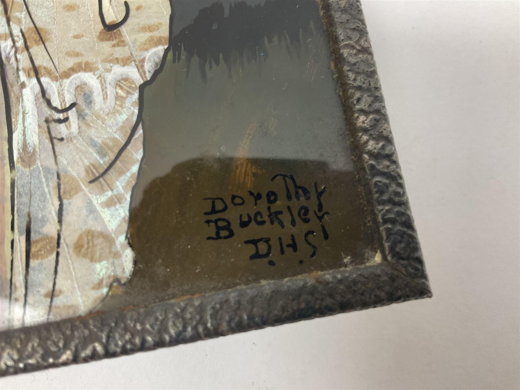 Seven 1930's butterfly wing pictures, mainly of ladies in period dress, one signed Dorothy Buckley, largest H18cm